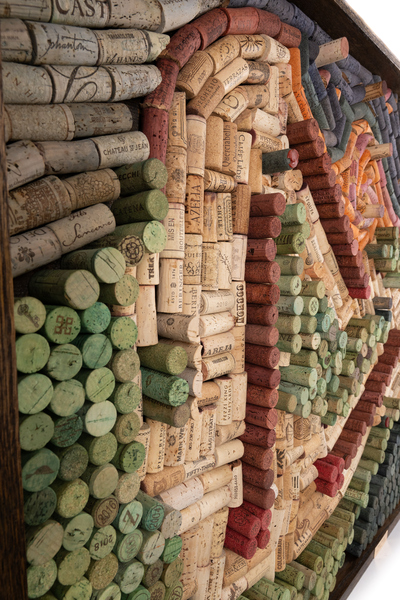 Close detail showing the dimensional wine cork craftsmanship in First Tracks